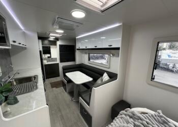 Dining area and kitchen in 2023 Viscount V3.2 Club Lounge caravan