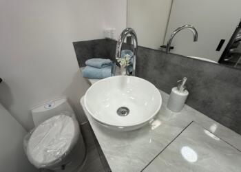 Wash basin and toilet in 2023 Viscount V3.2 Club Lounge caravan