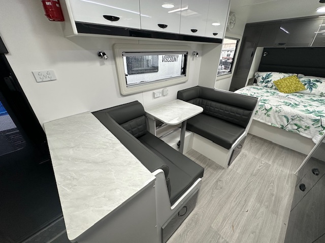 Dining and bed area in 2023 Viscount Wildshark V3.5 caravan