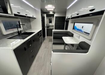 Dining and kitchenette in 2023 Viscount Wildshark V3.5 caravan