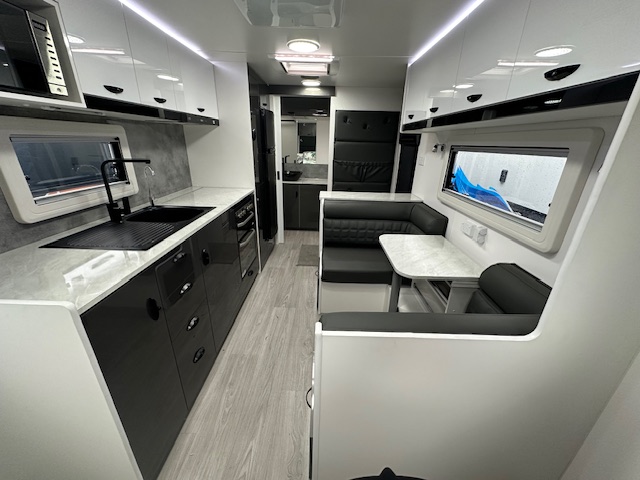 Dining and kitchenette in 2023 Viscount Wildshark V3.5 caravan