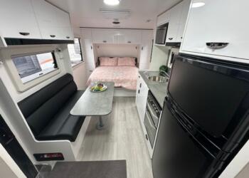 Sleeping and living area in a 2024 Viscount V1 caravan