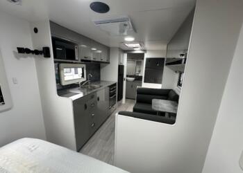 Kitchen and dining in the 2023 Viscount V2 Tandem