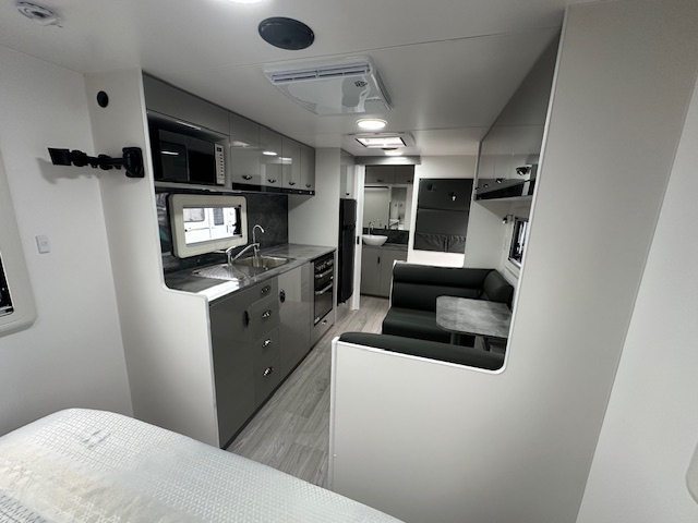 Kitchen and dining in the 2023 Viscount V2 Tandem