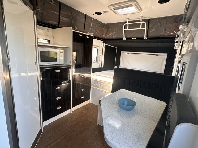 2018 Ezytrail Parks 15 - interior living area with seating and storage