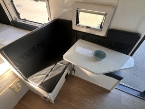 2018 Ezytrail Parks 15 - small L shaped seating with folding arm table